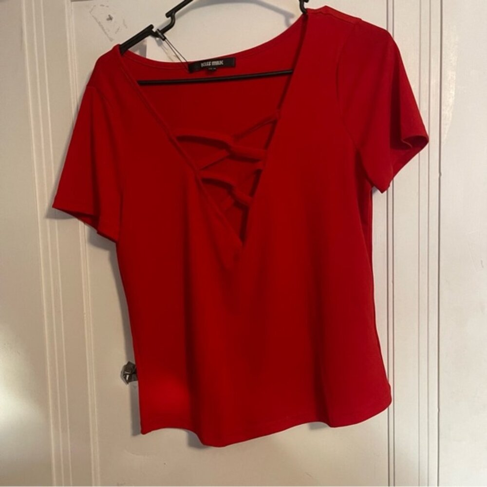 Kiss milk red ladies top.  Size 14